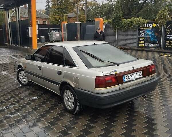 Серый Мазда 626, объемом двигателя 2 л и пробегом 343 тыс. км за 1273 $, фото 5 на Automoto.ua