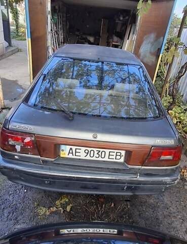 Серый Мазда 626, объемом двигателя 2 л и пробегом 396 тыс. км за 800 $, фото 1 на Automoto.ua