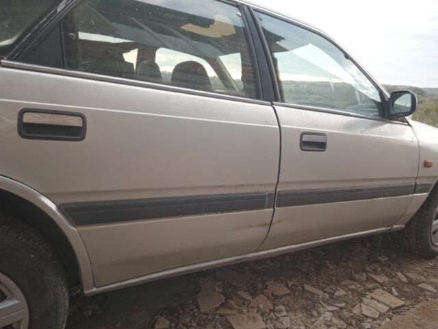 Серый Мазда 626, объемом двигателя 2 л и пробегом 320 тыс. км за 1079 $, фото 3 на Automoto.ua