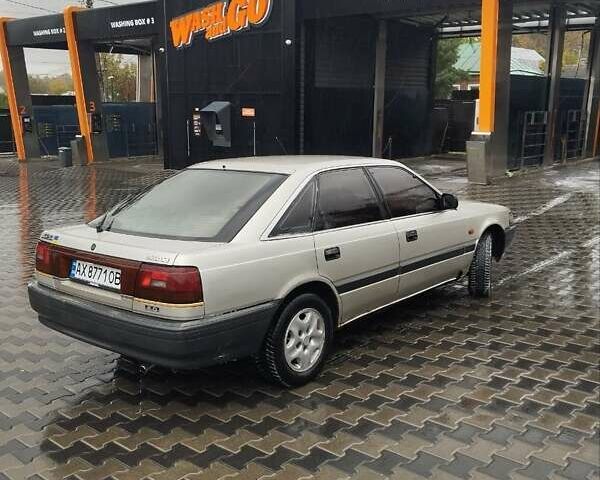 Серый Мазда 626, объемом двигателя 2 л и пробегом 343 тыс. км за 1273 $, фото 3 на Automoto.ua