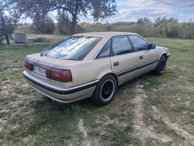 Серый Мазда 626, объемом двигателя 2 л и пробегом 320 тыс. км за 2022 $, фото 5 на Automoto.ua