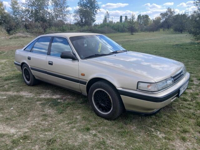 Серый Мазда 626, объемом двигателя 2 л и пробегом 320 тыс. км за 2022 $, фото 4 на Automoto.ua