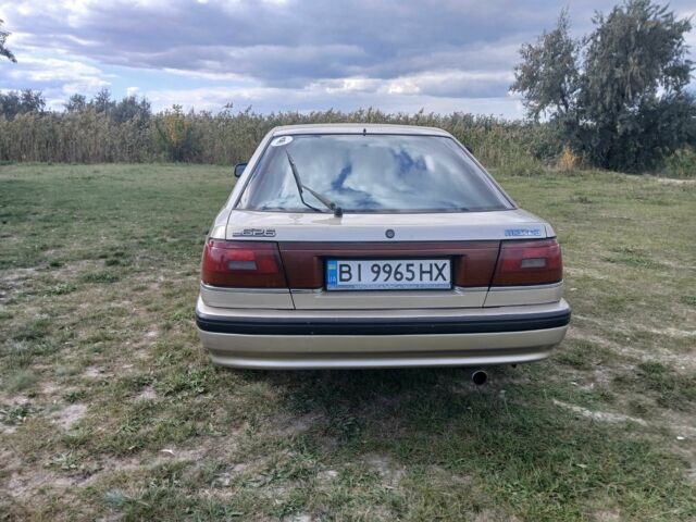 Серый Мазда 626, объемом двигателя 2 л и пробегом 320 тыс. км за 2022 $, фото 2 на Automoto.ua