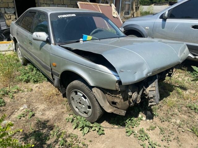 Серый Мазда 626, объемом двигателя 1.8 л и пробегом 300 тыс. км за 399 $, фото 1 на Automoto.ua