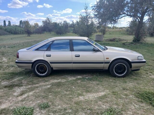 Серый Мазда 626, объемом двигателя 2 л и пробегом 320 тыс. км за 2022 $, фото 3 на Automoto.ua