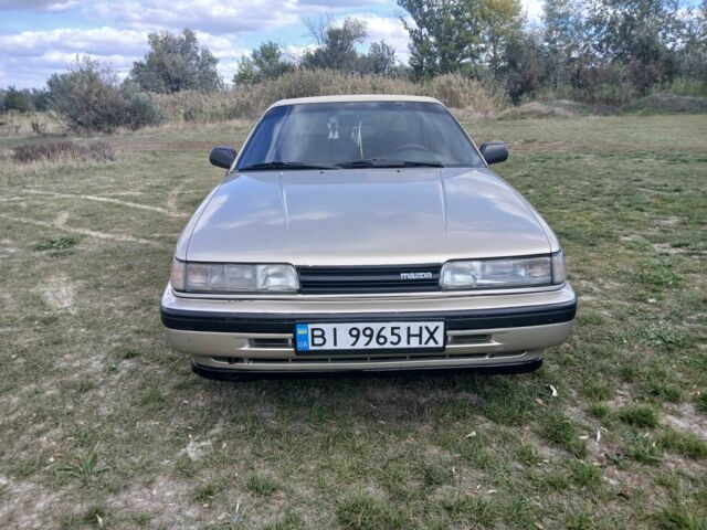 Серый Мазда 626, объемом двигателя 2 л и пробегом 320 тыс. км за 2022 $, фото 6 на Automoto.ua