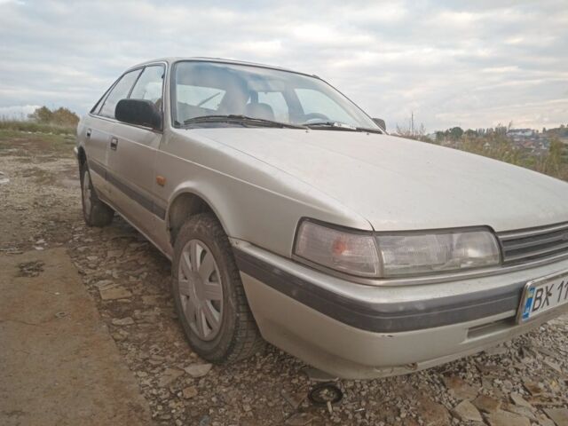 Серый Мазда 626, объемом двигателя 2 л и пробегом 320 тыс. км за 1079 $, фото 5 на Automoto.ua