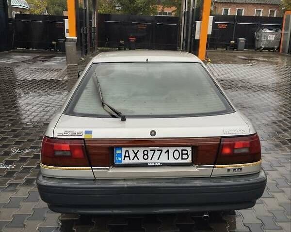 Серый Мазда 626, объемом двигателя 2 л и пробегом 343 тыс. км за 1273 $, фото 4 на Automoto.ua