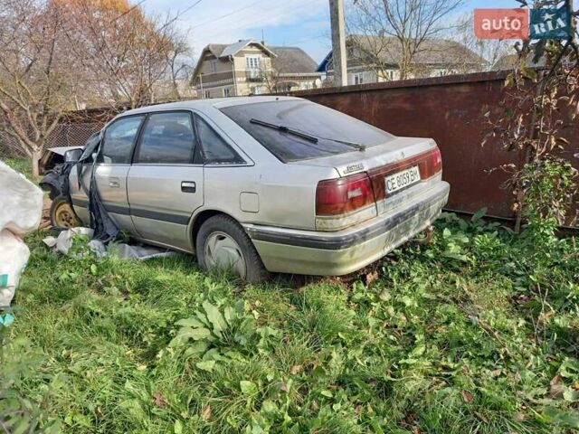 Серый Мазда 626, объемом двигателя 2 л и пробегом 500 тыс. км за 600 $, фото 5 на Automoto.ua