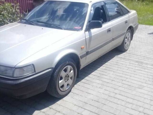 Серый Мазда 626, объемом двигателя 2 л и пробегом 360 тыс. км за 1000 $, фото 2 на Automoto.ua