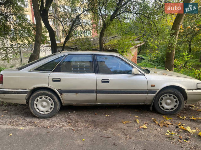 Серый Мазда 626, объемом двигателя 2 л и пробегом 355 тыс. км за 1000 $, фото 2 на Automoto.ua