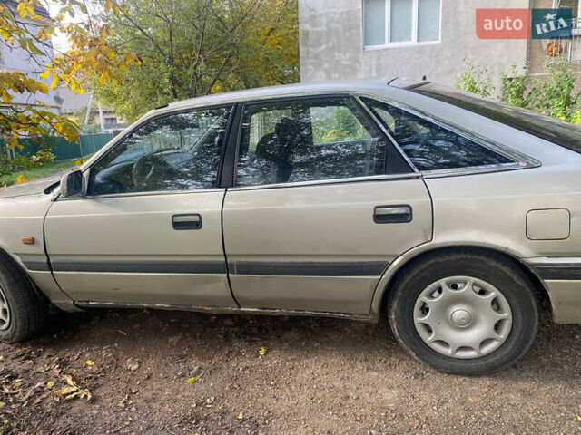 Серый Мазда 626, объемом двигателя 2 л и пробегом 355 тыс. км за 1000 $, фото 3 на Automoto.ua