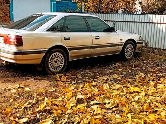 Сірий Мазда 626, об'ємом двигуна 2 л та пробігом 527 тис. км за 950 $, фото 4 на Automoto.ua