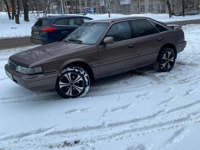 Серый Мазда 626, объемом двигателя 2 л и пробегом 57 тыс. км за 1300 $, фото 5 на Automoto.ua