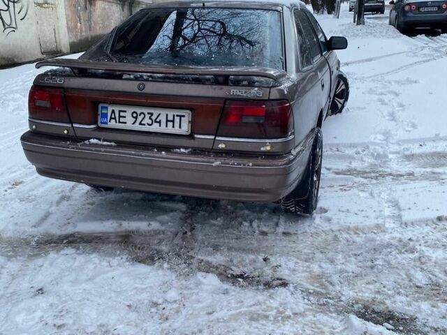 Серый Мазда 626, объемом двигателя 2 л и пробегом 57 тыс. км за 1300 $, фото 4 на Automoto.ua