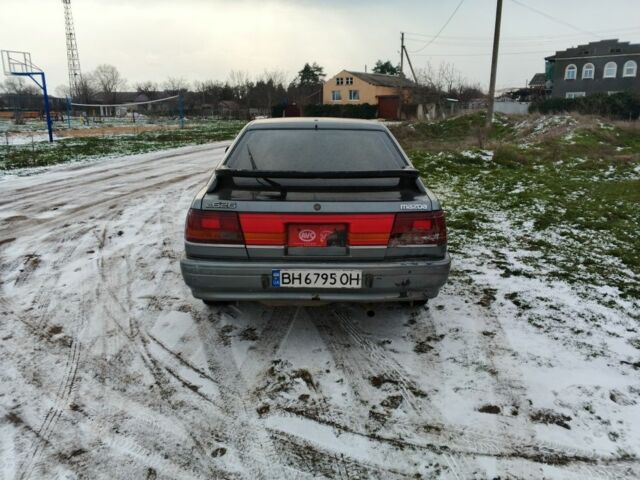 Сірий Мазда 626, об'ємом двигуна 2.2 л та пробігом 300 тис. км за 950 $, фото 4 на Automoto.ua