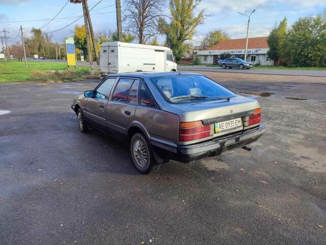 Серый Мазда 626, объемом двигателя 2 л и пробегом 200 тыс. км за 750 $, фото 4 на Automoto.ua