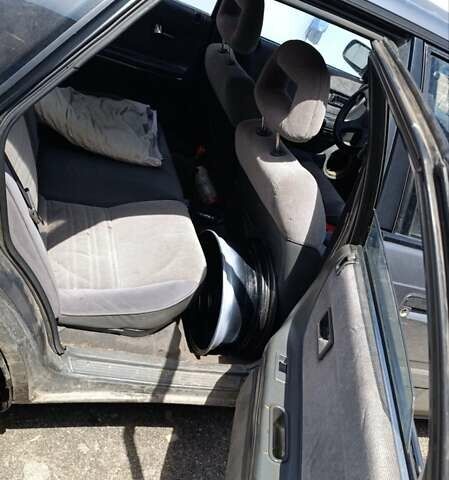 Серый Мазда 626, объемом двигателя 2 л и пробегом 430 тыс. км за 1200 $, фото 4 на Automoto.ua