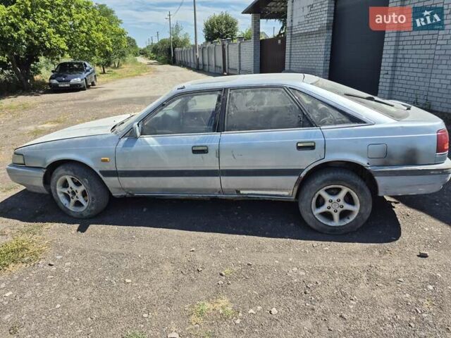 Сірий Мазда 626, об'ємом двигуна 2 л та пробігом 250 тис. км за 600 $, фото 2 на Automoto.ua