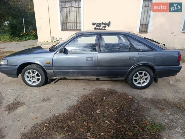 Серый Мазда 626, объемом двигателя 2 л и пробегом 430 тыс. км за 1200 $, фото 2 на Automoto.ua