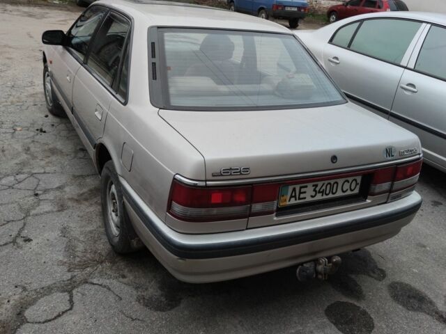 Серый Мазда 626, объемом двигателя 1.8 л и пробегом 3 тыс. км за 1400 $, фото 1 на Automoto.ua