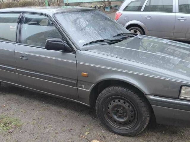 Серый Мазда 626, объемом двигателя 1.8 л и пробегом 300 тыс. км за 1300 $, фото 3 на Automoto.ua