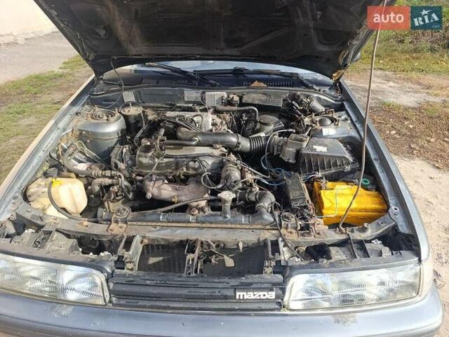 Серый Мазда 626, объемом двигателя 2 л и пробегом 430 тыс. км за 1200 $, фото 6 на Automoto.ua