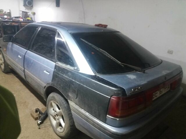 Серый Мазда 626, объемом двигателя 1.8 л и пробегом 400 тыс. км за 1050 $, фото 2 на Automoto.ua