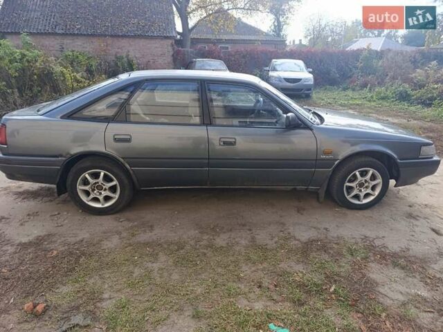 Серый Мазда 626, объемом двигателя 2 л и пробегом 430 тыс. км за 1200 $, фото 3 на Automoto.ua