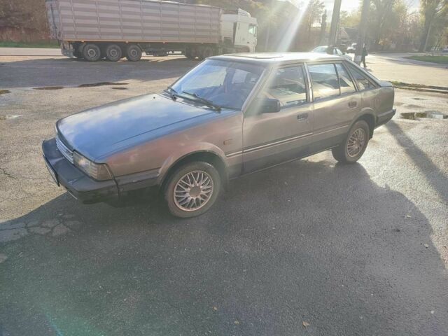 Серый Мазда 626, объемом двигателя 2 л и пробегом 200 тыс. км за 750 $, фото 5 на Automoto.ua