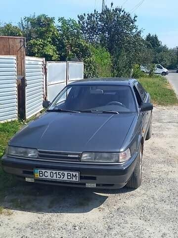 Серый Мазда 626, объемом двигателя 2 л и пробегом 300 тыс. км за 1900 $, фото 3 на Automoto.ua