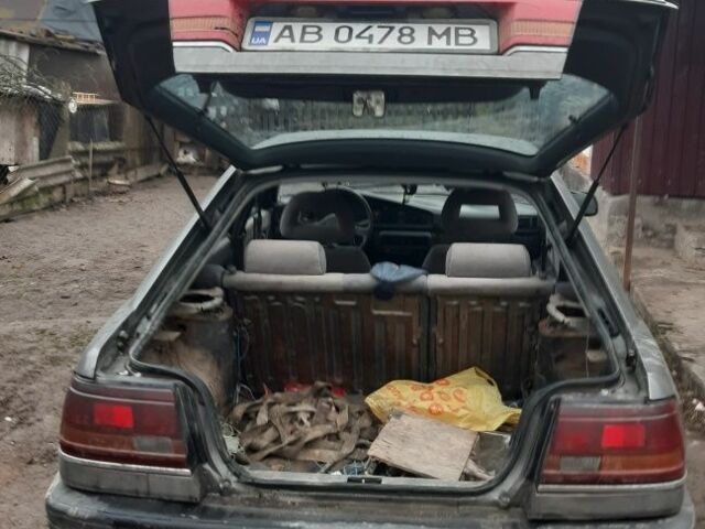 Серый Мазда 626, объемом двигателя 2 л и пробегом 200 тыс. км за 600 $, фото 10 на Automoto.ua