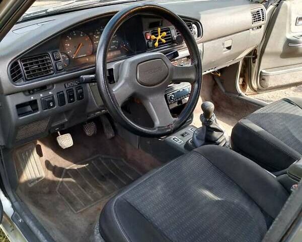 Серый Мазда 626, объемом двигателя 2 л и пробегом 485 тыс. км за 1500 $, фото 3 на Automoto.ua