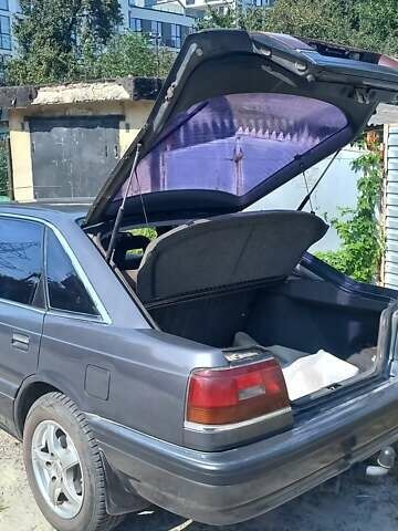 Серый Мазда 626, объемом двигателя 2 л и пробегом 300 тыс. км за 1900 $, фото 4 на Automoto.ua