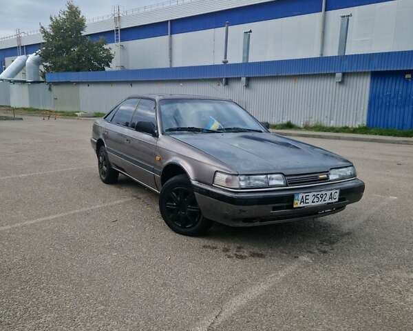 Мазда 626 1991 в Днепре (Днепропетровске) на Automoto.ua Серый Мазда 626, объемом двигателя 2 л и пробегом 333 тыс. км за 1700 $, фото 5 на Automoto.ua