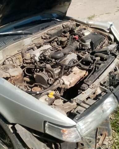 Серый Мазда 626, объемом двигателя 2 л и пробегом 300 тыс. км за 1200 $, фото 2 на Automoto.ua