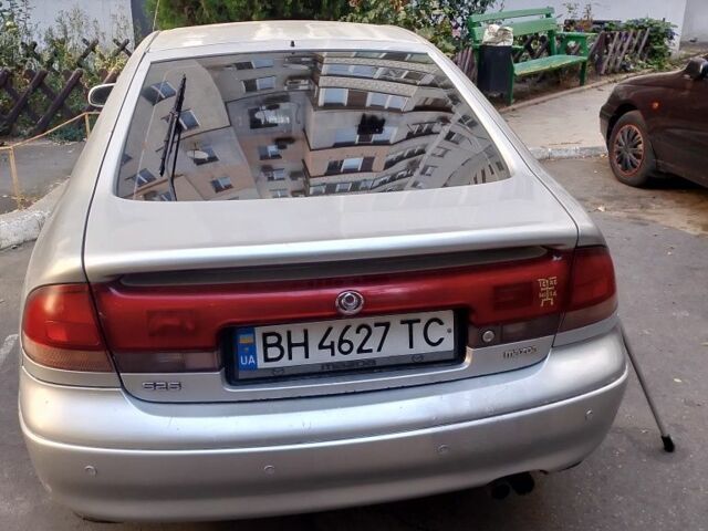 Серый Мазда 626, объемом двигателя 2.5 л и пробегом 300 тыс. км за 2000 $, фото 2 на Automoto.ua