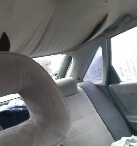 Серый Мазда 626, объемом двигателя 2 л и пробегом 200 тыс. км за 600 $, фото 1 на Automoto.ua