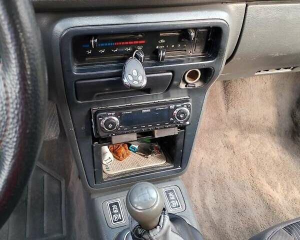 Серый Мазда 626, объемом двигателя 2 л и пробегом 485 тыс. км за 1500 $, фото 1 на Automoto.ua