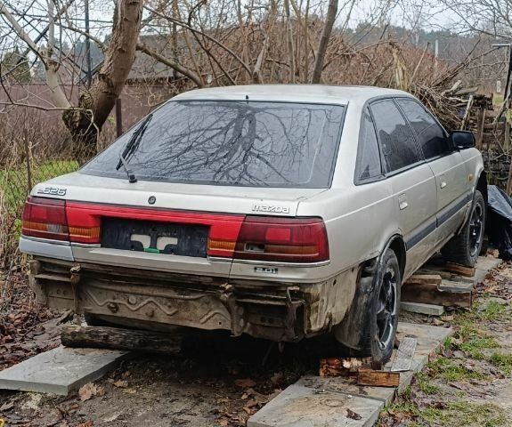 Серый Мазда 626, объемом двигателя 2 л и пробегом 40 тыс. км за 100 $, фото 1 на Automoto.ua