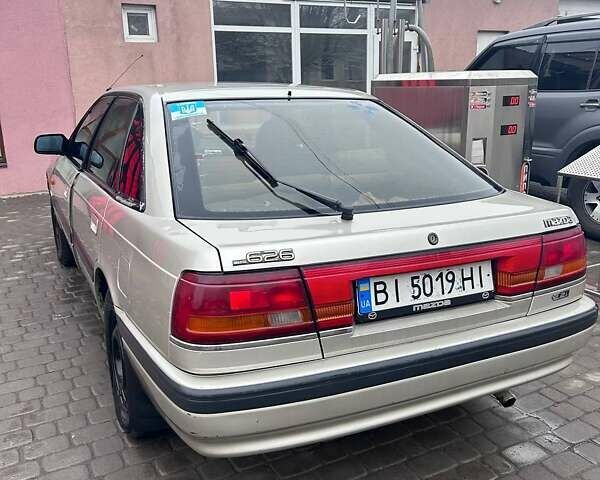 Сірий Мазда 626, об'ємом двигуна 2.18 л та пробігом 342 тис. км за 1800 $, фото 5 на Automoto.ua