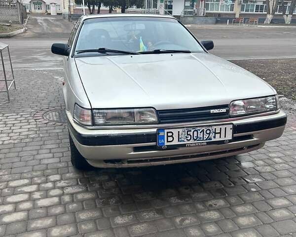 Сірий Мазда 626, об'ємом двигуна 2.18 л та пробігом 342 тис. км за 1800 $, фото 1 на Automoto.ua