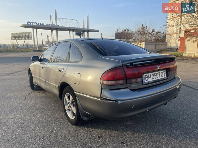 Сірий Мазда 626, об'ємом двигуна 2 л та пробігом 300 тис. км за 2350 $, фото 1 на Automoto.ua