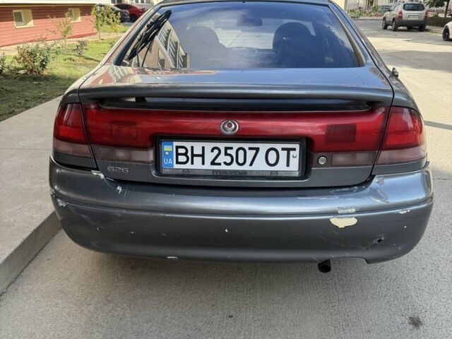 Сірий Мазда 626, об'ємом двигуна 2 л та пробігом 349 тис. км за 1900 $, фото 5 на Automoto.ua