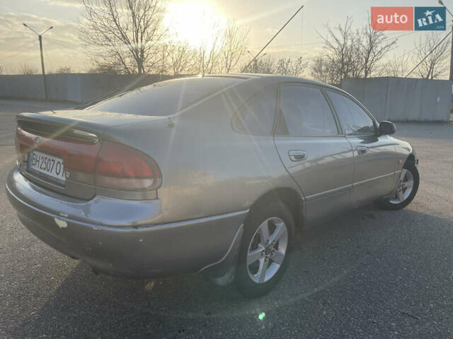 Сірий Мазда 626, об'ємом двигуна 2 л та пробігом 300 тис. км за 2350 $, фото 2 на Automoto.ua