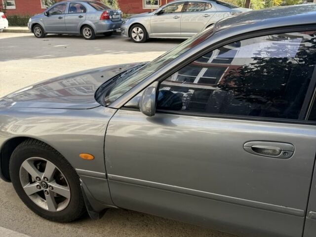 Сірий Мазда 626, об'ємом двигуна 2 л та пробігом 349 тис. км за 1900 $, фото 2 на Automoto.ua