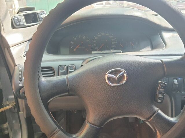 Серый Мазда 626, объемом двигателя 2.5 л и пробегом 288 тыс. км за 716 $, фото 8 на Automoto.ua