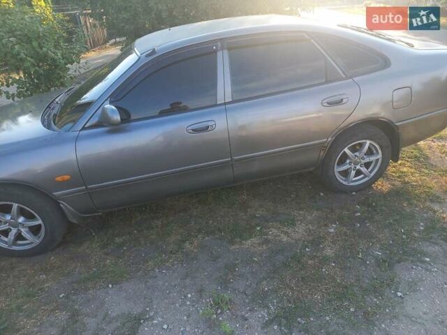 Серый Мазда 626, объемом двигателя 1.99 л и пробегом 300 тыс. км за 2500 $, фото 3 на Automoto.ua