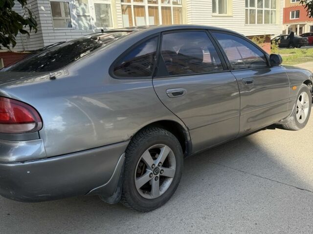 Сірий Мазда 626, об'ємом двигуна 2 л та пробігом 349 тис. км за 1900 $, фото 7 на Automoto.ua