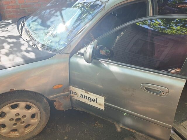 Серый Мазда 626, объемом двигателя 2.5 л и пробегом 288 тыс. км за 716 $, фото 7 на Automoto.ua